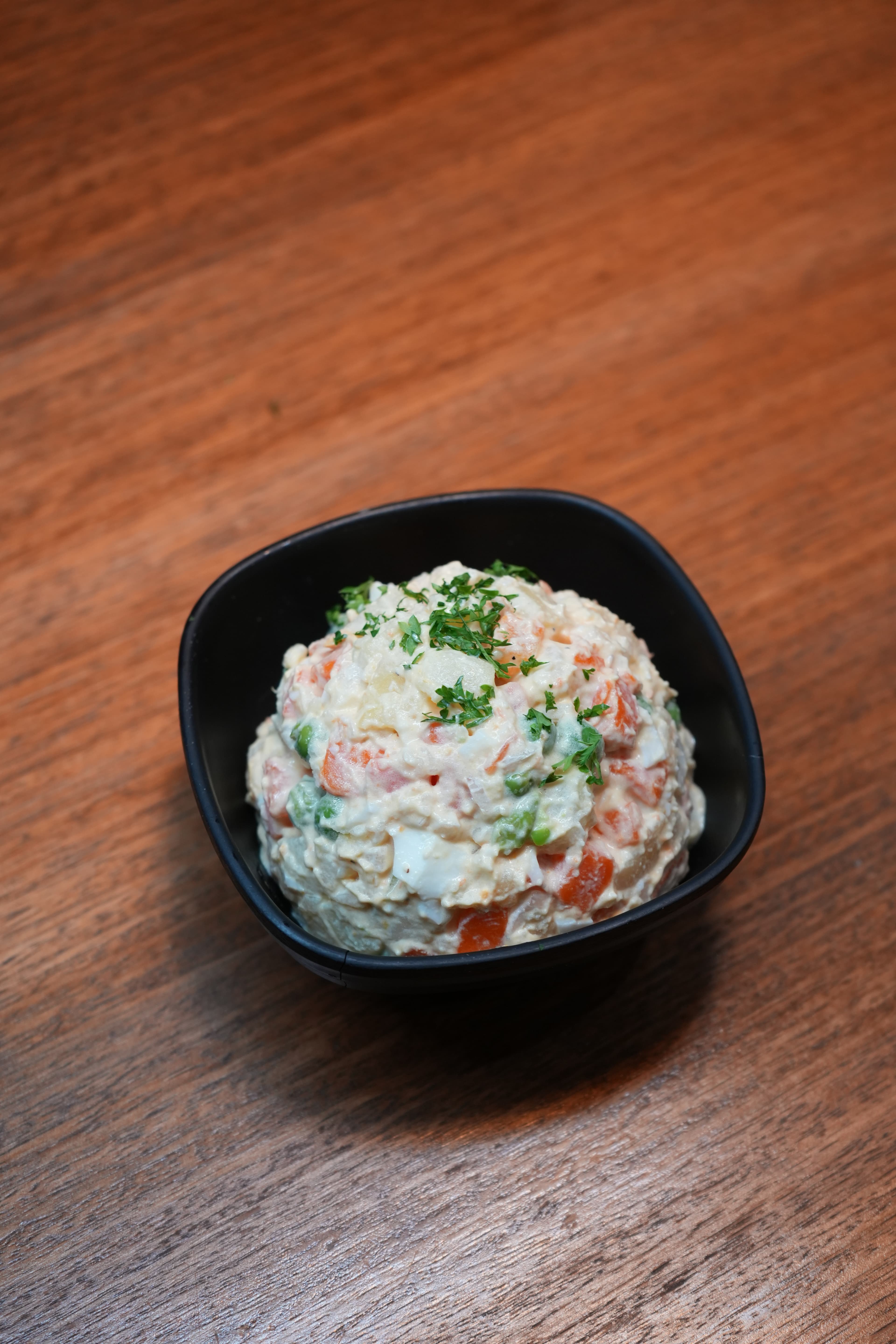 Porción ensalada de papa